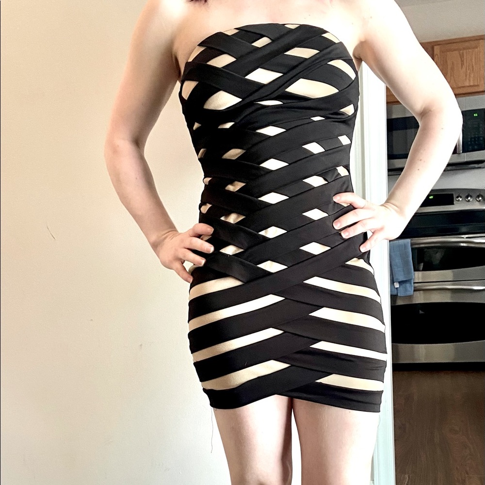 A black and nude party dress in a size small!